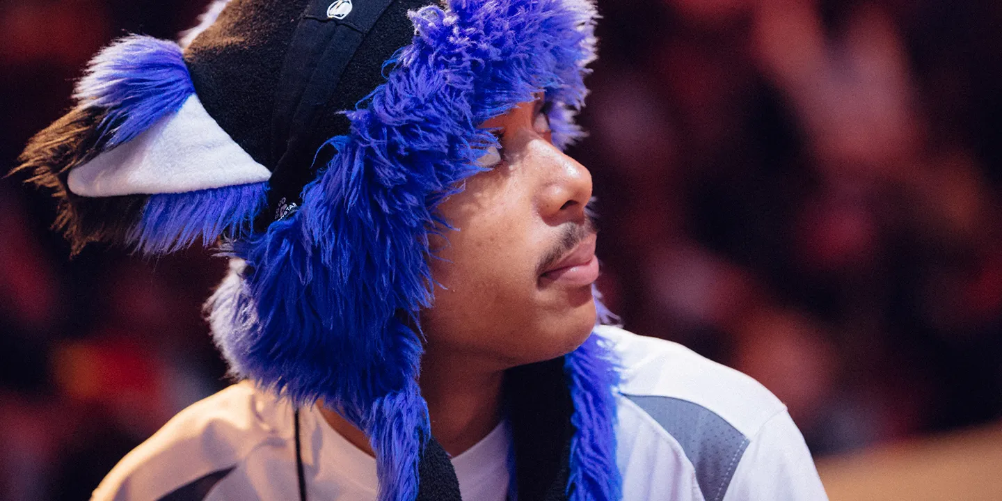 SonicFox looks to the side while playing FGC competitive matches.