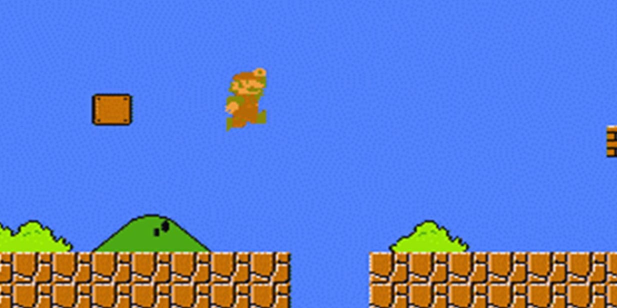 Mario jumping in the old-school Super Mario game.