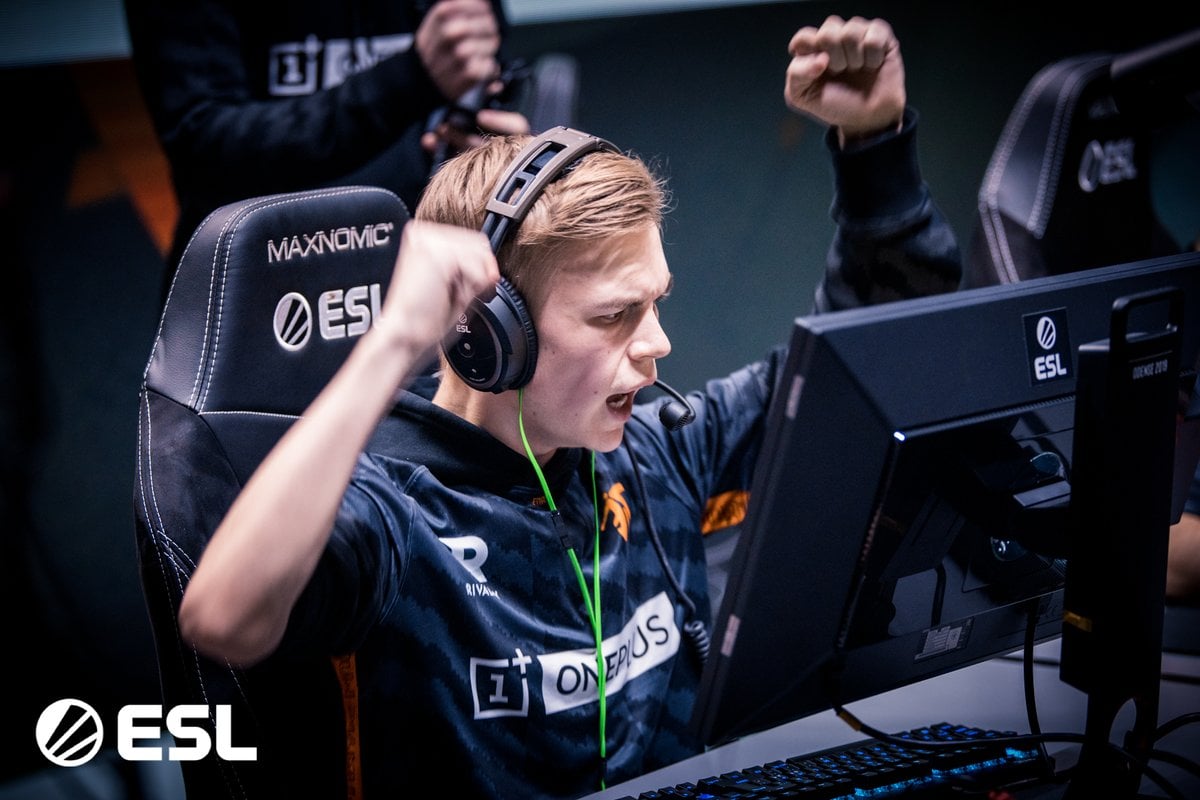 Brollan celebrates with his fists raised while playing at ESL.