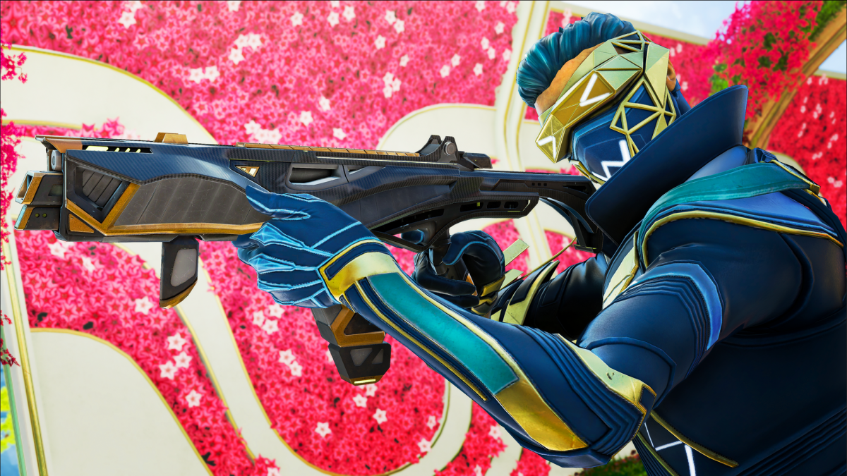 Octane holds an R-99 as he advanced with a wall covered in pink flowers behind him.