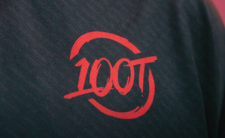100 Thieves' red "100T" logo on a black jersey.