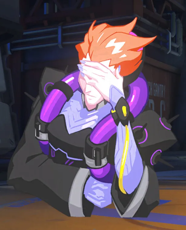 Moira with her head in her hands.