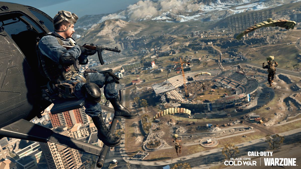 A special forces soldier sits on a helicopter above Verdansk, a deserted city in Call of Duty
