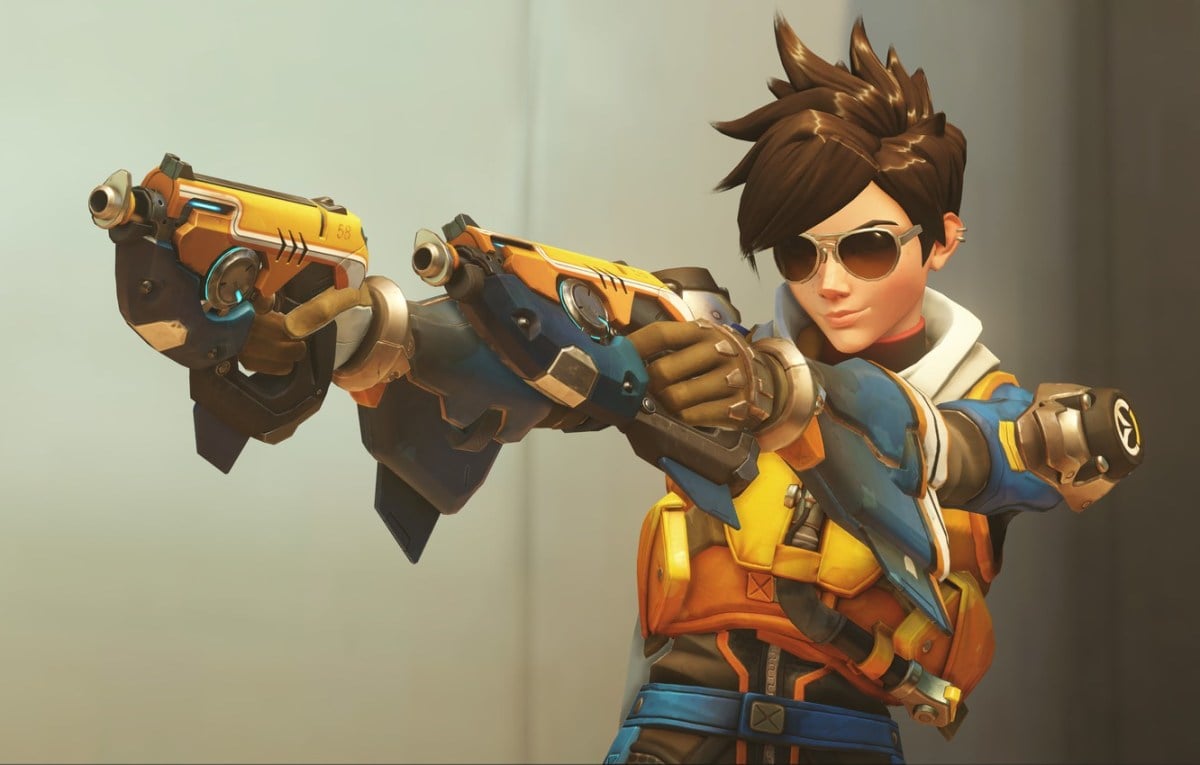 Tracer from Overwatch 2, wearing an orange and blue jacket and cool sunglasses.