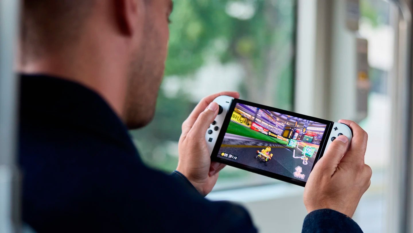 How to use an SD card with the Nintendo Switch OLED - Dot Esports