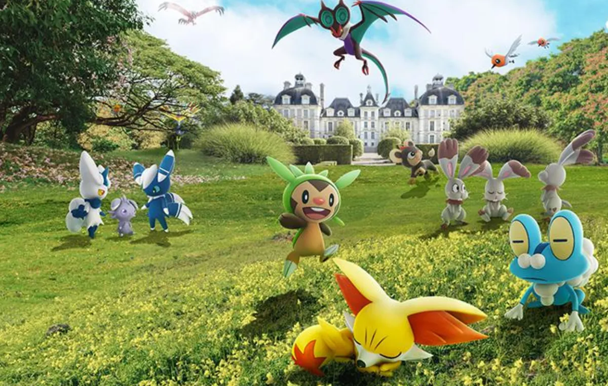 A handful of Pokémon from the Kalos region relax on a field, including Chespin, Fennekin, Froakie, Espurr, both genders of Meowstic, Bunnelby, Litleo, Fletchling, and Noivern.
