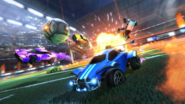 Cover art for Rocket League showing a few cars leaving behind an explosion while racing toward the camera.