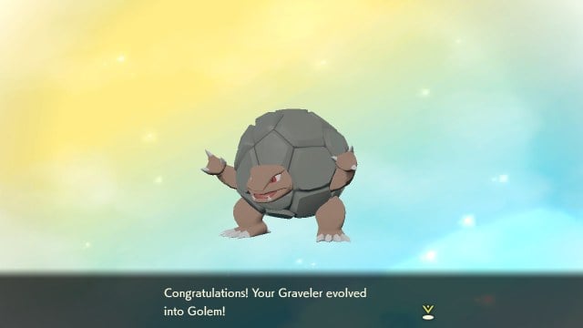 This Screenshot shows readers a freshly evolved Graveler, a species with a spherical rock body and brown limbs and head.