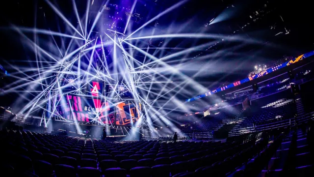The Royal Arena lit by lights for a Counter-Strike tournament.