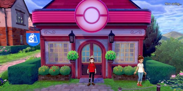 Pokémon Center with player character standing outside in Pokémon Sword and Shield.