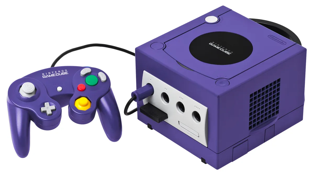 A purple GameCube with an attached controller.