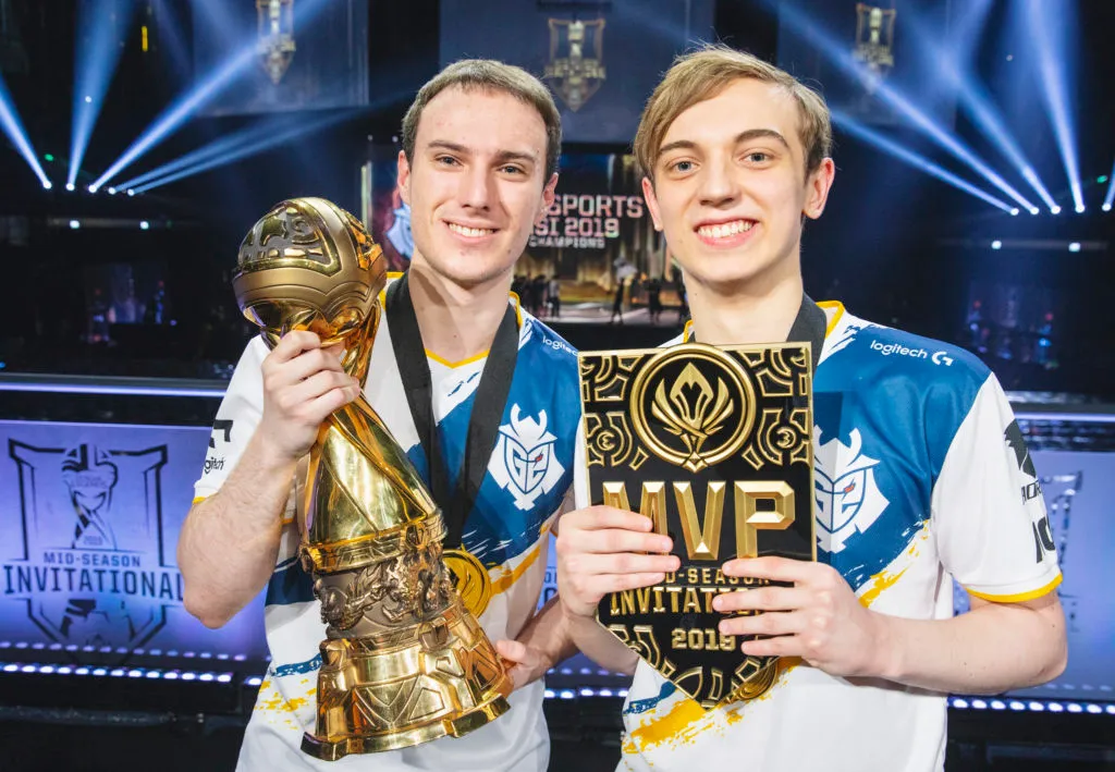 Caps and Perkz pose with the MSI trophy after winning the tournament for G2 Esports LoL in 2019