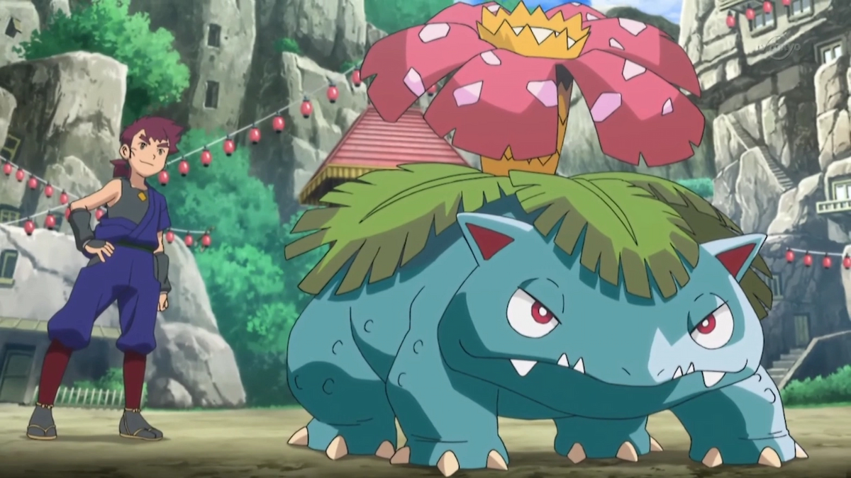 Venusaur and its trainer in a battle in the Pokémon anime.