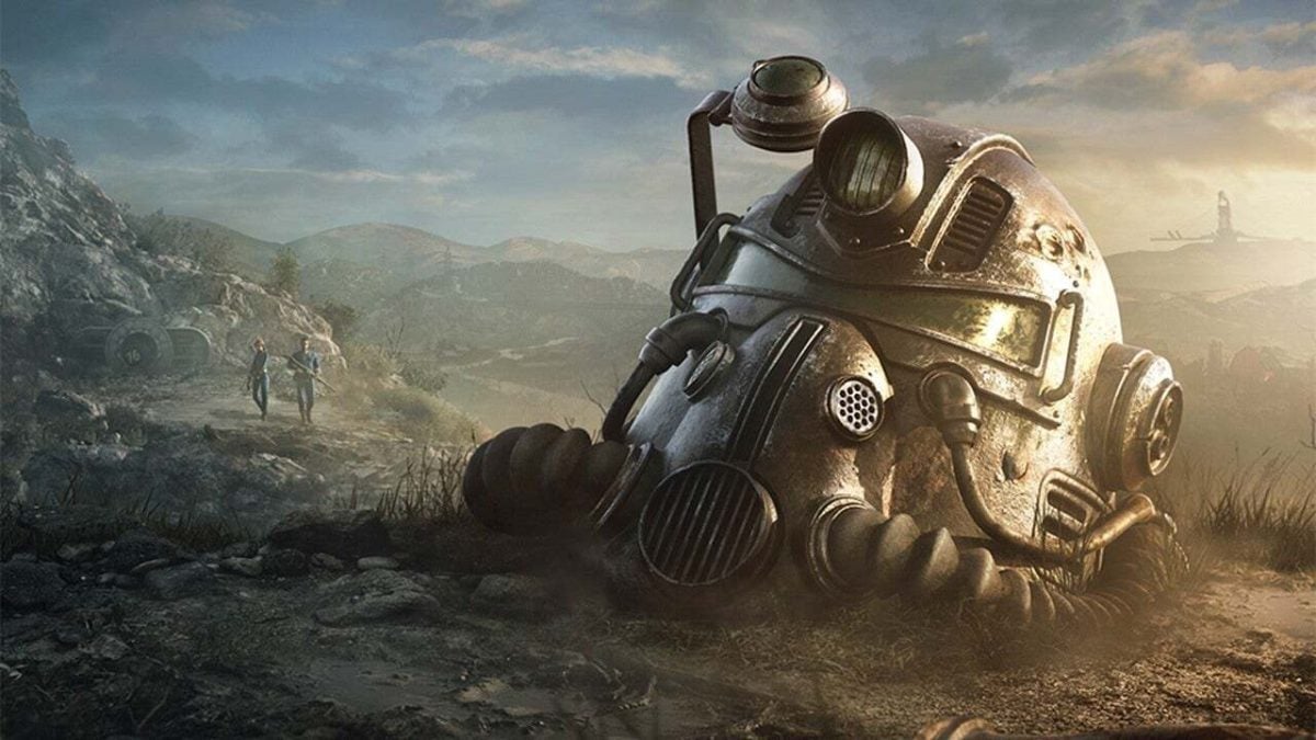 A steal helmet with gask mask vents sits on the ground with a wasteland stretching out behind it.