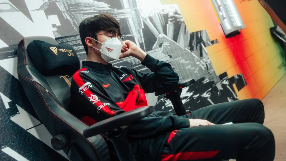 Faker with his eyes closed backstage sighing after a loss