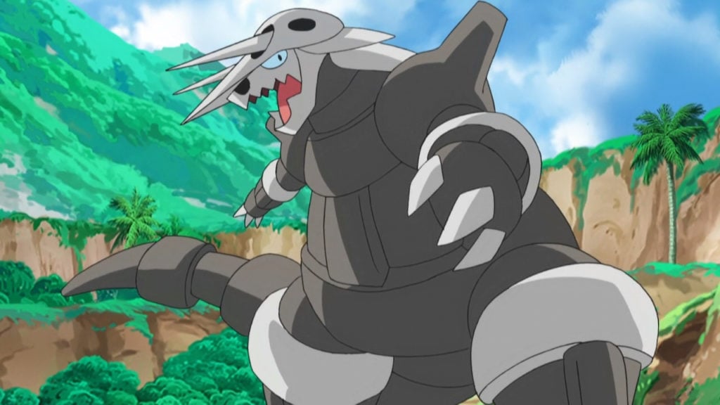 Aggron stands at the base of a mountain.