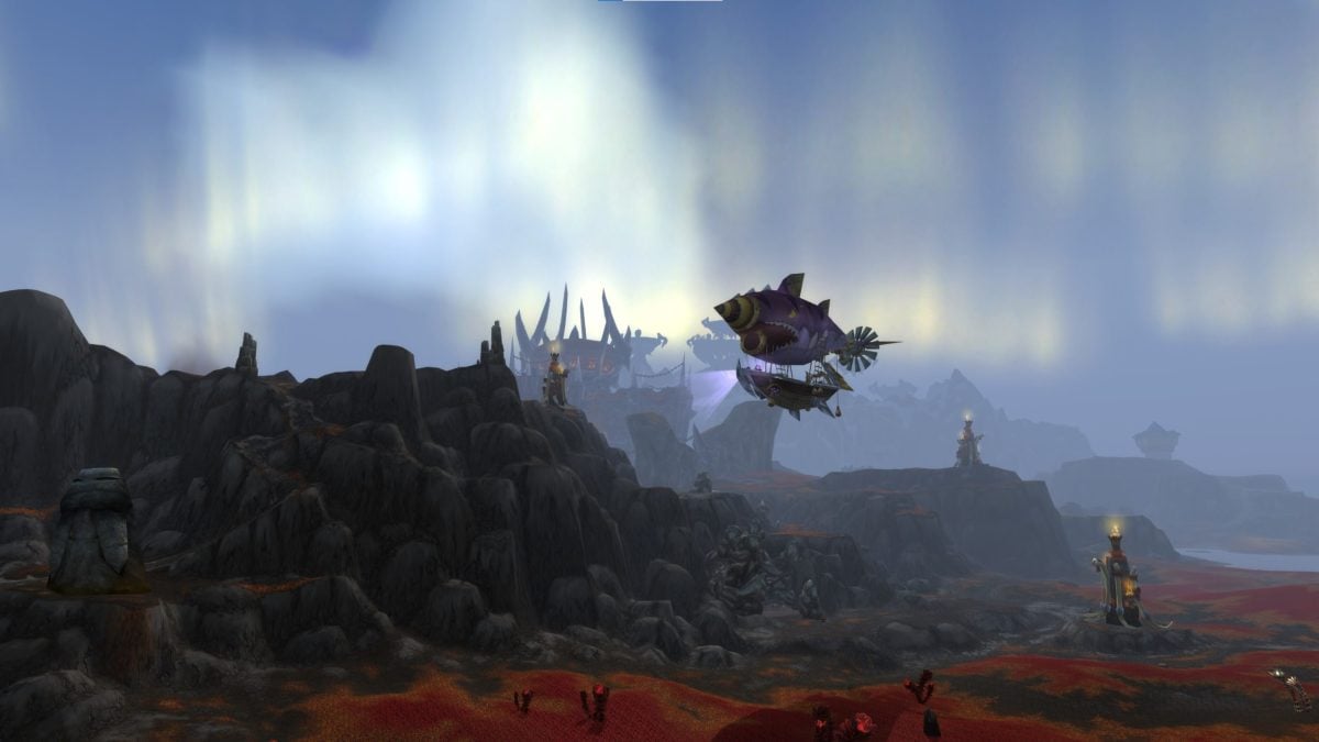 A zeppelin flies over the Borean Tundra in World of Warcraft