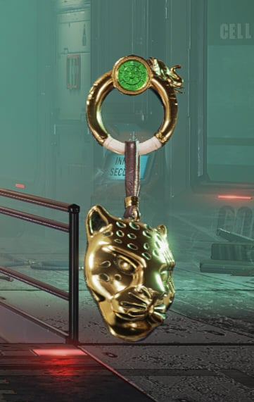 A golden panther's head weapon charm.