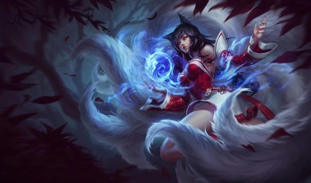 Ahri holding one of her blue orbs.