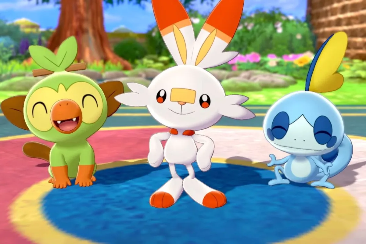 Grookey, Scorbunny, and Sobble waiting to be chosen as a starter Pokémon in Sword and Shield.