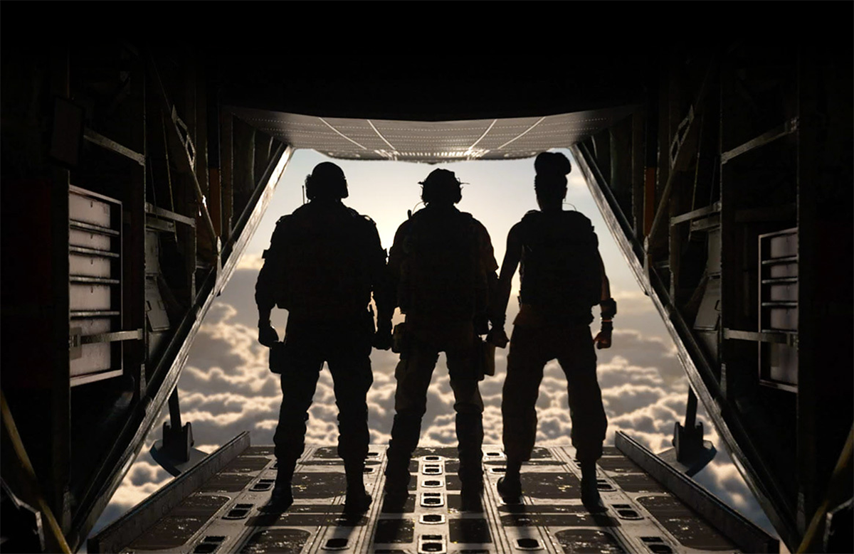 Three characters stand on the edge of a plane ramp ready to drop into CoD Warzone.