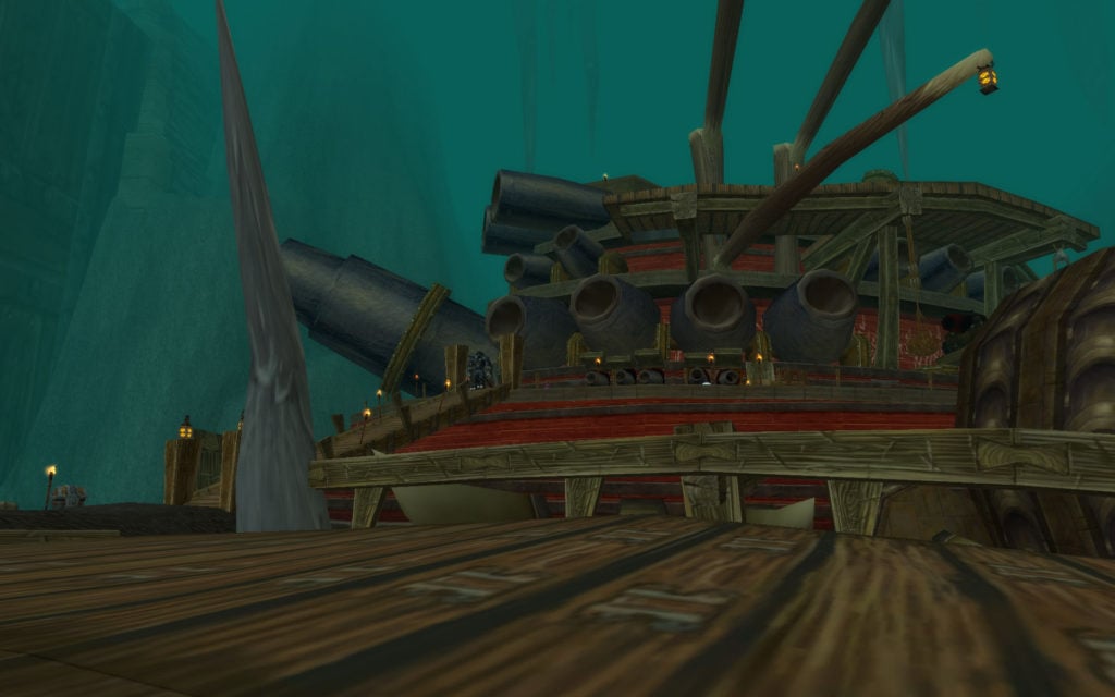 An in-game WoW screenshot of the final room of the Deadmine dungeon in WoW. The large pirate ship in the indoor cove is pictured.