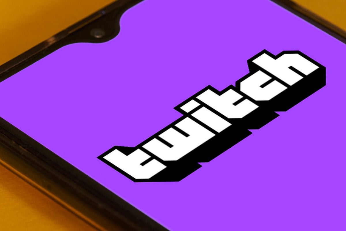 A picture of the Twitch logo on a purple background of a smartphone.