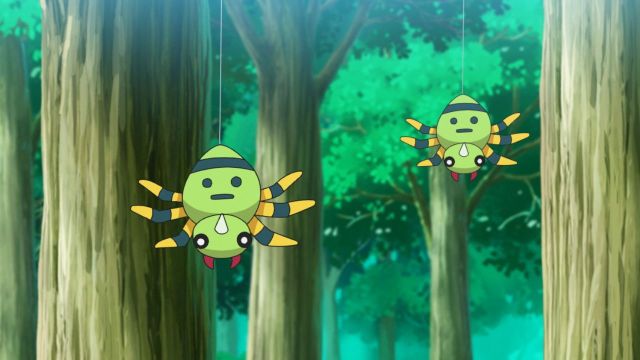 Spinarak Pokémon duo hanging down from trees in the anime.