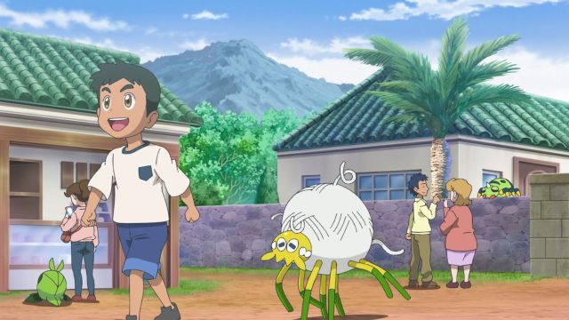 Green and white Tarountula Pokémon taking a walk with a trainer through a village.