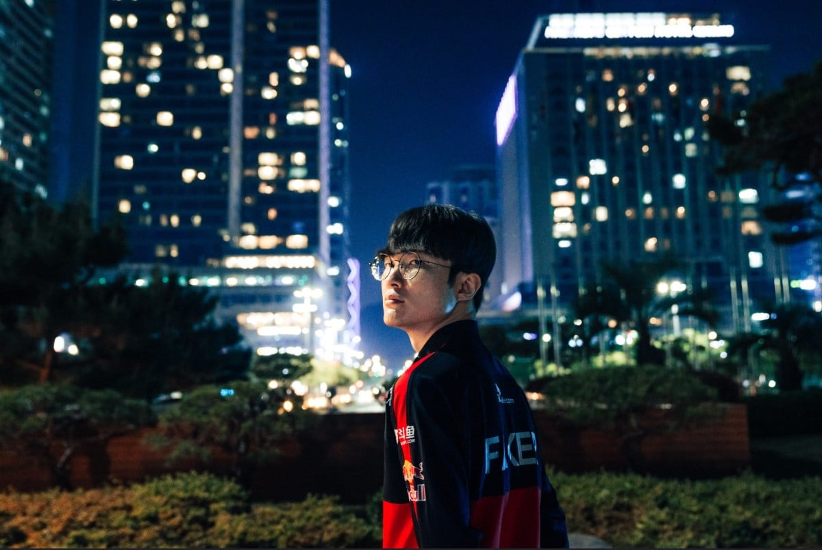 Faker standing in a city on a photoshoot day for League of Legends