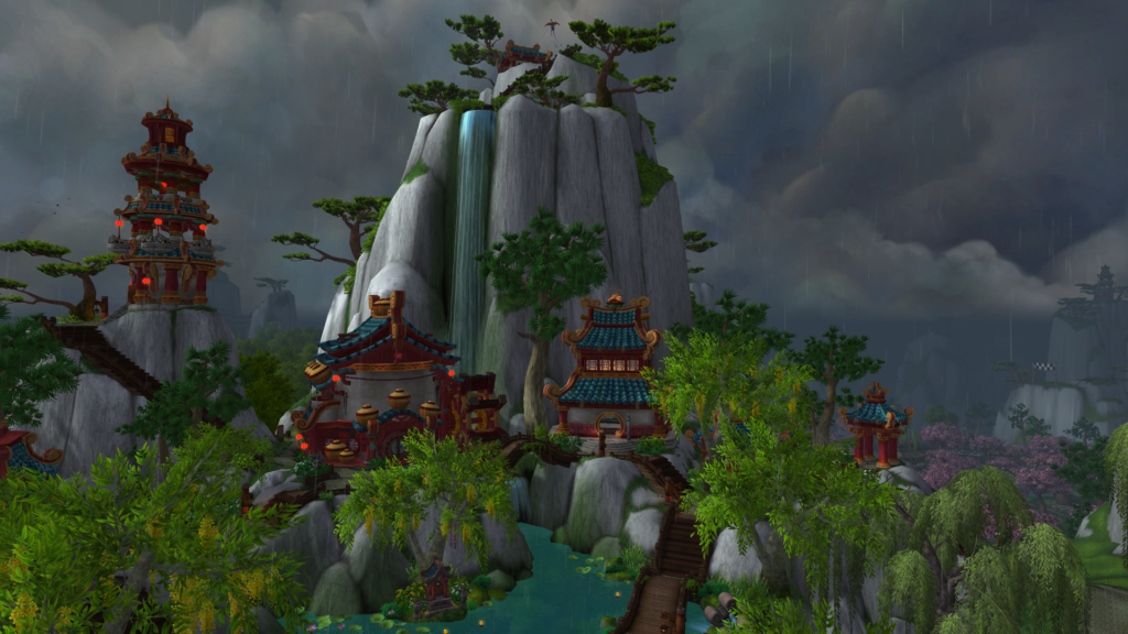 A view of Dawn's Blossom in the Jade Forest in WoW. Pandaren architecture and foliage are present throughout.