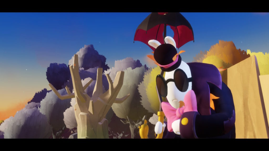 A large Rabbid in dark sunglasses holds an umbrella over his head on a sunny day