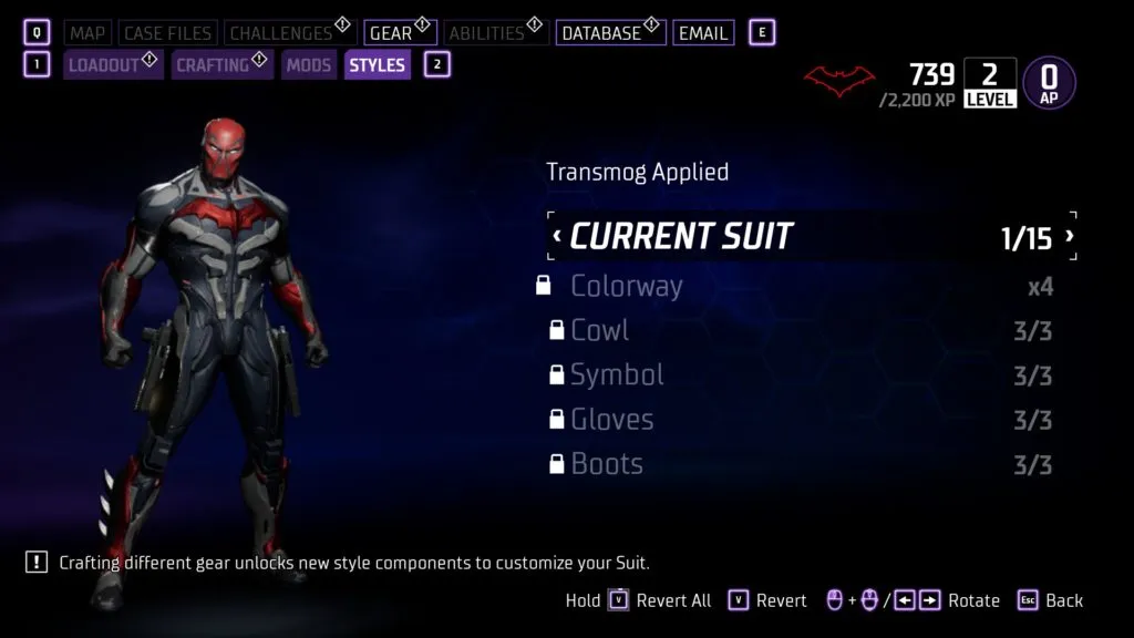 A screengrab of Red Hood from Gotham Knights in a white, black, and red suit with his red mask