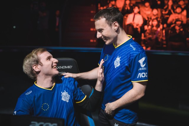 Perkz and Jankos competing in LoL together on stage.