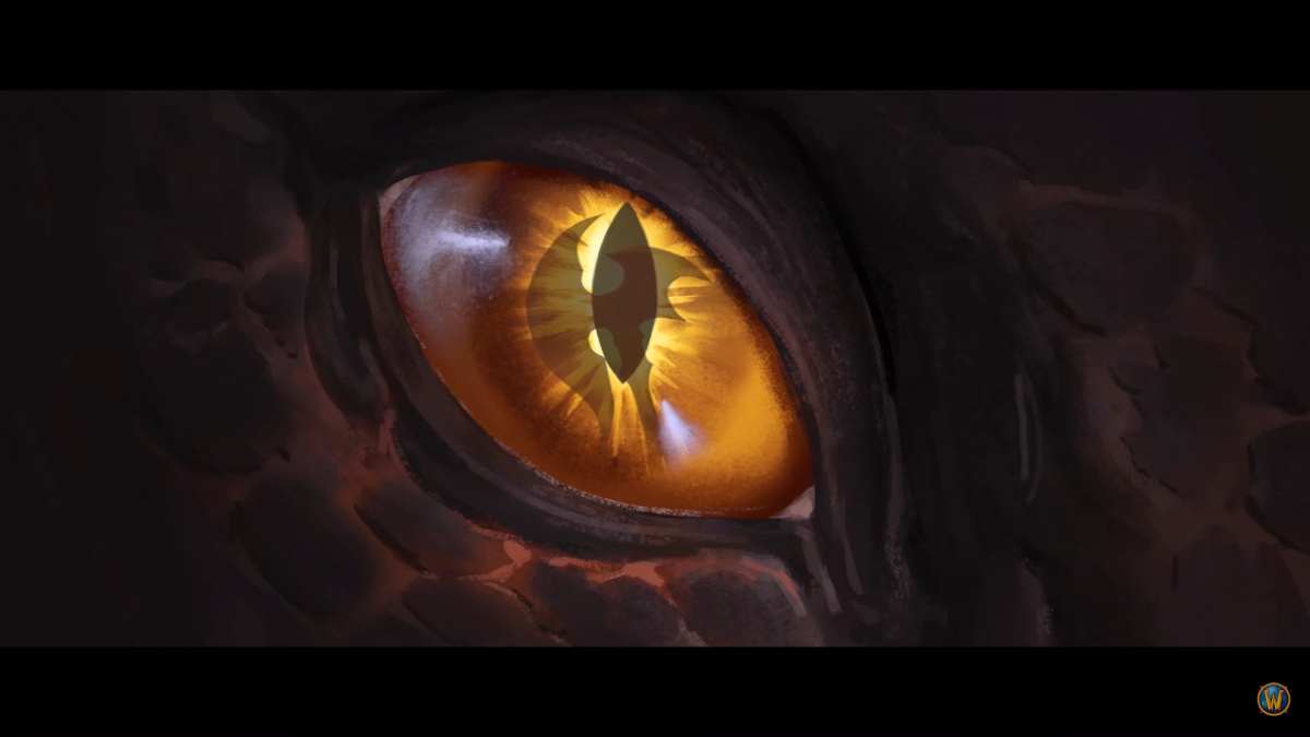 A yellow and orange dragon eye peeks out from a dark black background