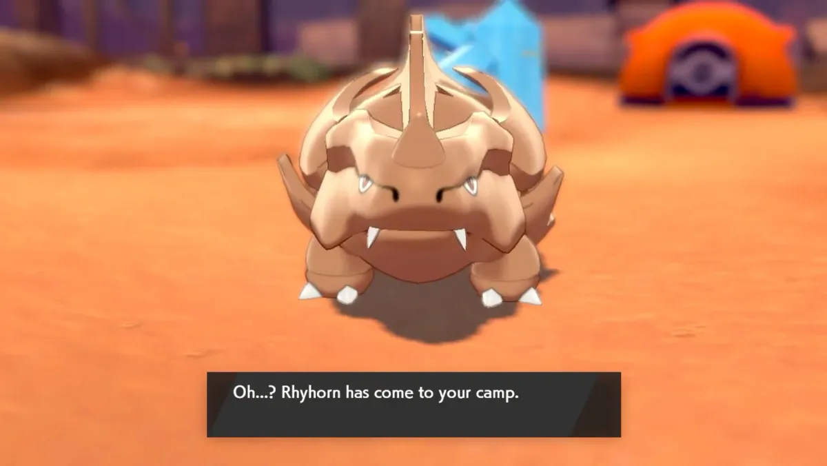 A shiny Rhyhorn approaches the player's camp.
