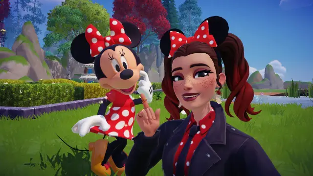 The player taking a selfie with Minnie Mouse.