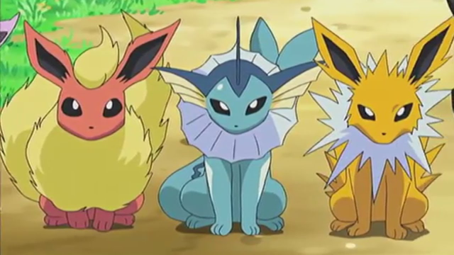 Flareon, Vaporeon, and Jolteon sitting in the Pokémon anime.