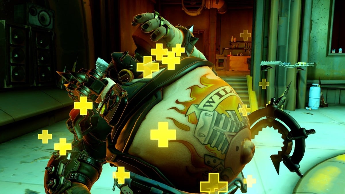 Roadhog uses his Take a Breather ability while floating yellow plus signs surround him.