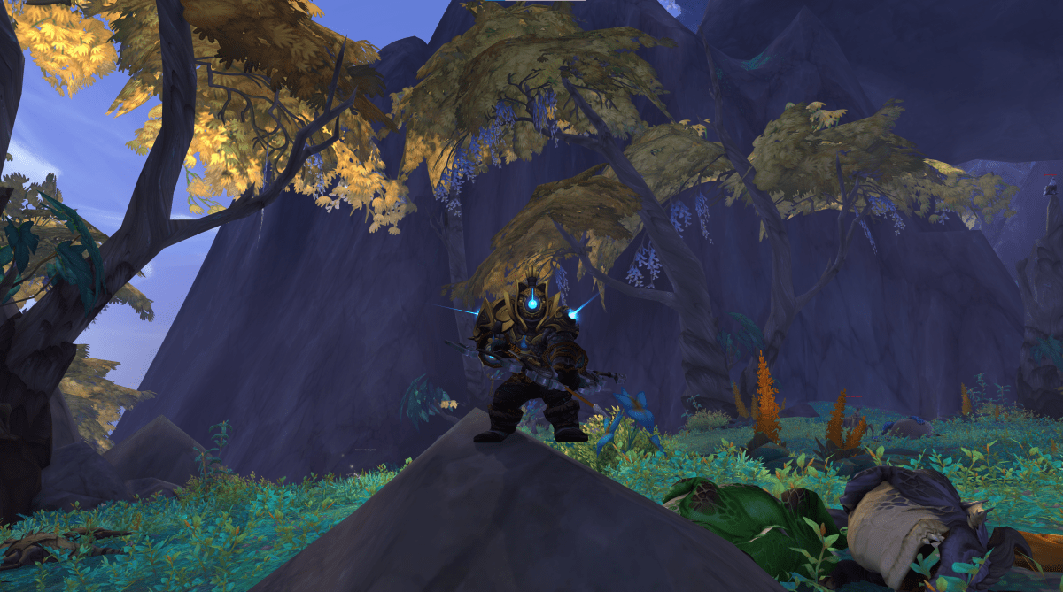 A dwarf hunter stands in combat stance in WoW Dragonflight.