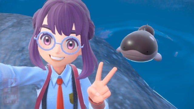 A Pokémon trainer from Scarlet and Violet takes a selfie with a Clodsire swimming in the background.