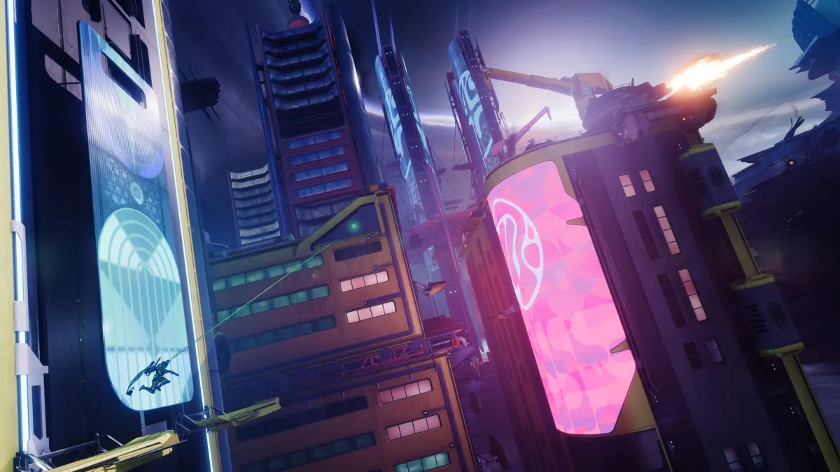 An image of the neon-soaked city of Neomuna in Lightfall, with high-rise buildings and pink neon lights.