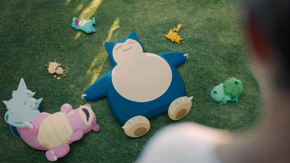 Snorlax and other Pokemon sleeping on grass.