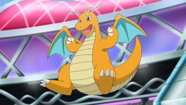 Dragonite poses triumphantly in the air.