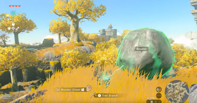 Link using a power on a large boulder.