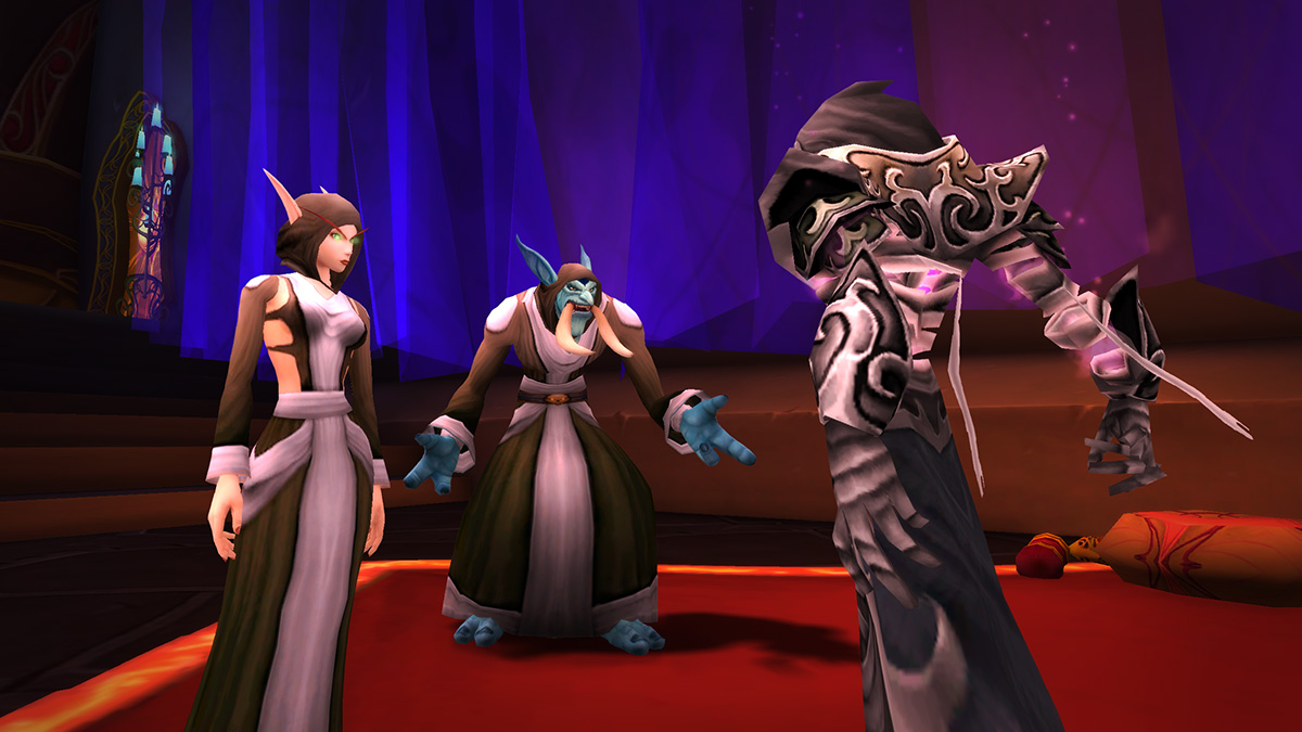 3 WoW characters standing next to each other and chatting