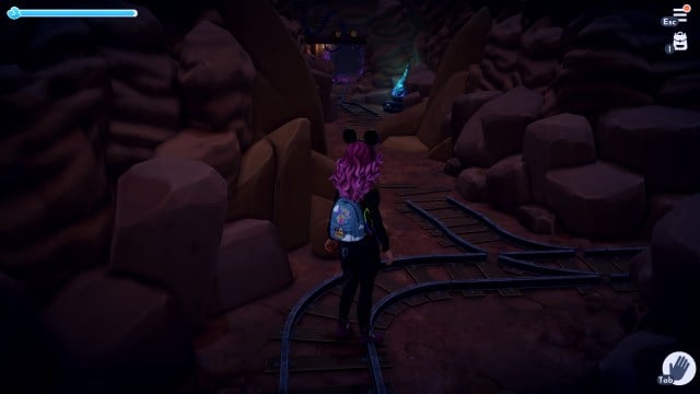 The player standing at a fork in the mines. 