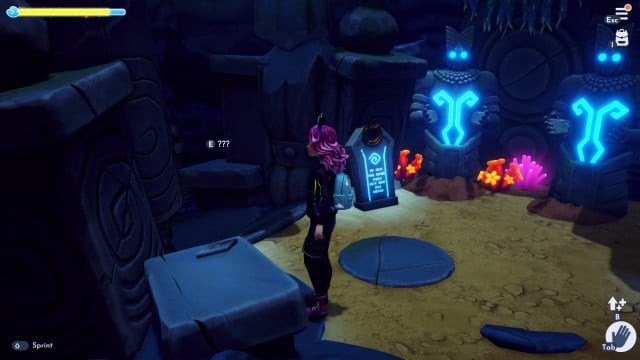 The player looking at a diamond symbol in the Mystical Cave. 