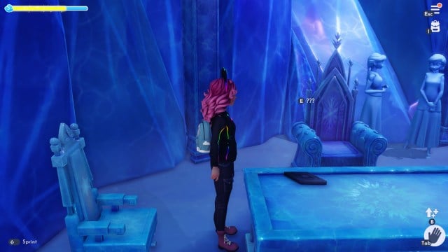 The player looking at a diamond symbol on Elsa's table. 