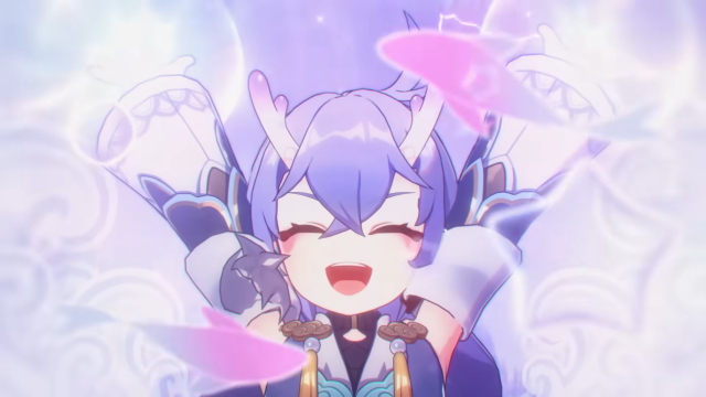 Bailu throwing her hands into the air and smiling. 
